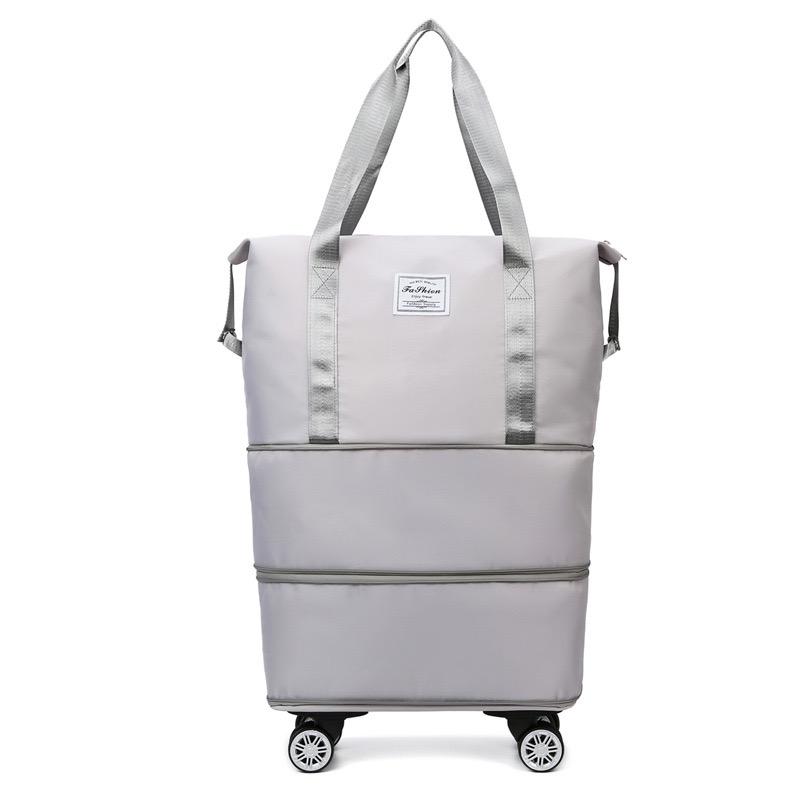 Expandable rolling travel bag